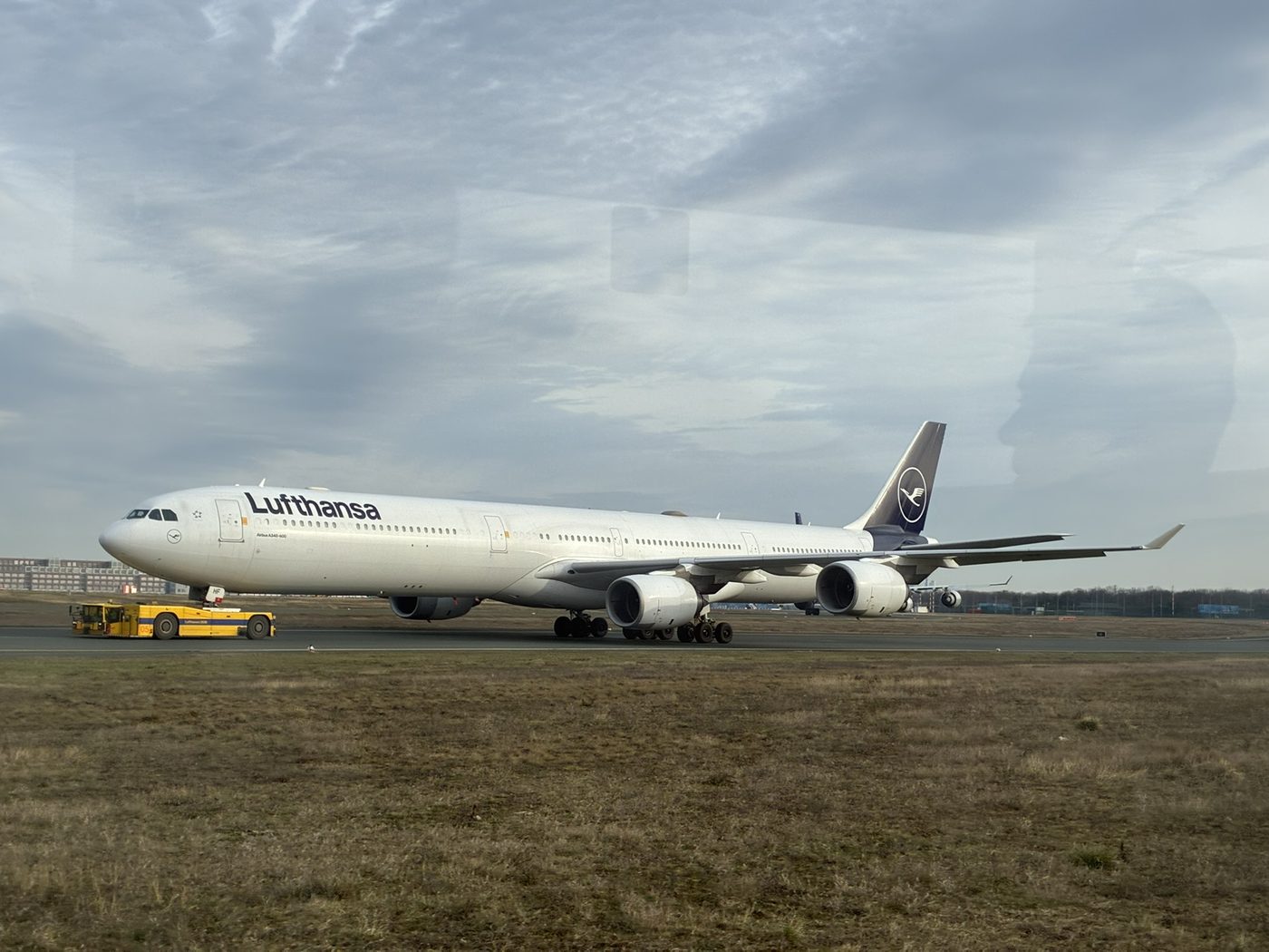 A Lufthansa aircraft parked on the airport apron