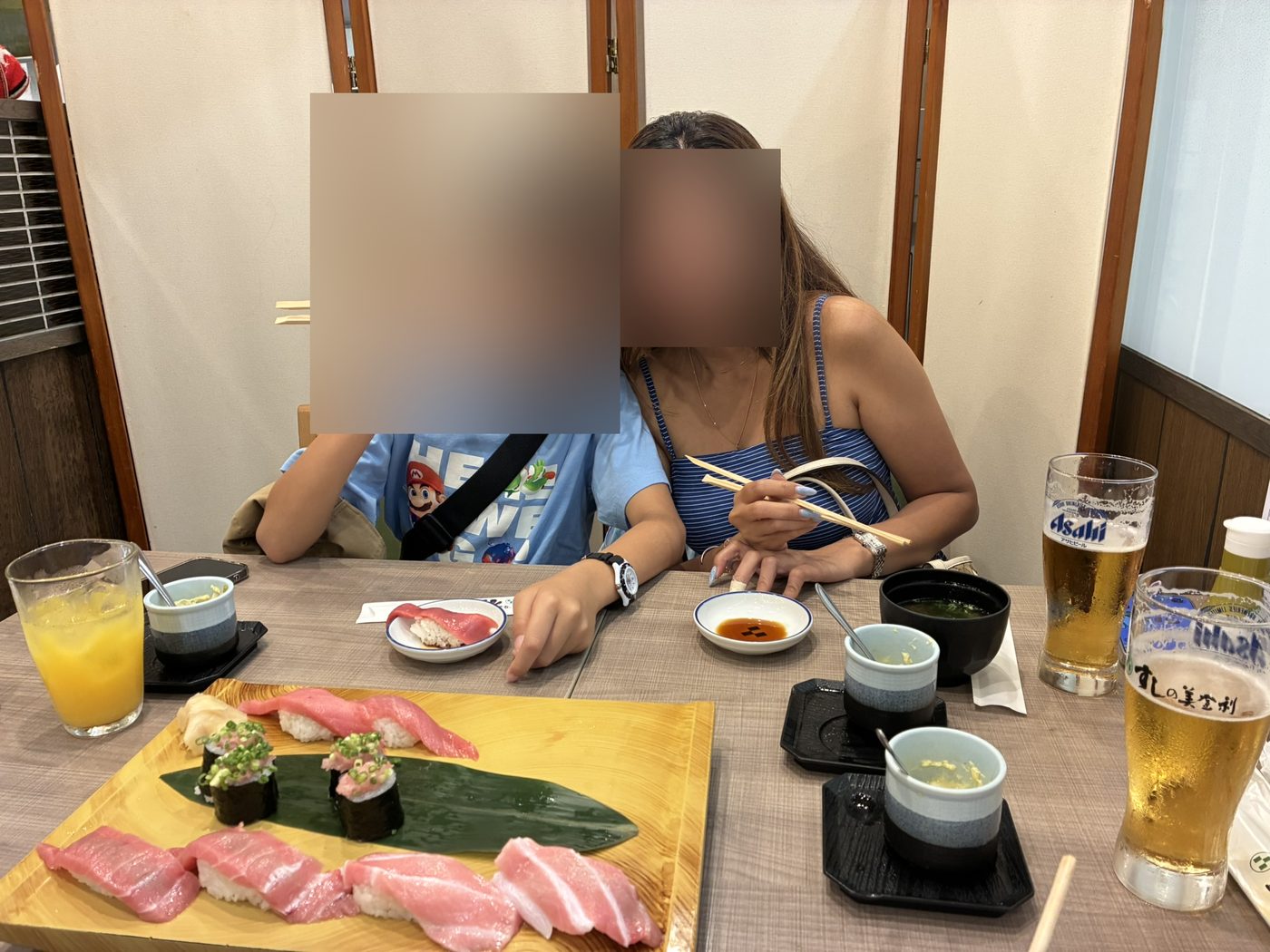 Sharing a sushi dinner at a local restaurant in Tokyo